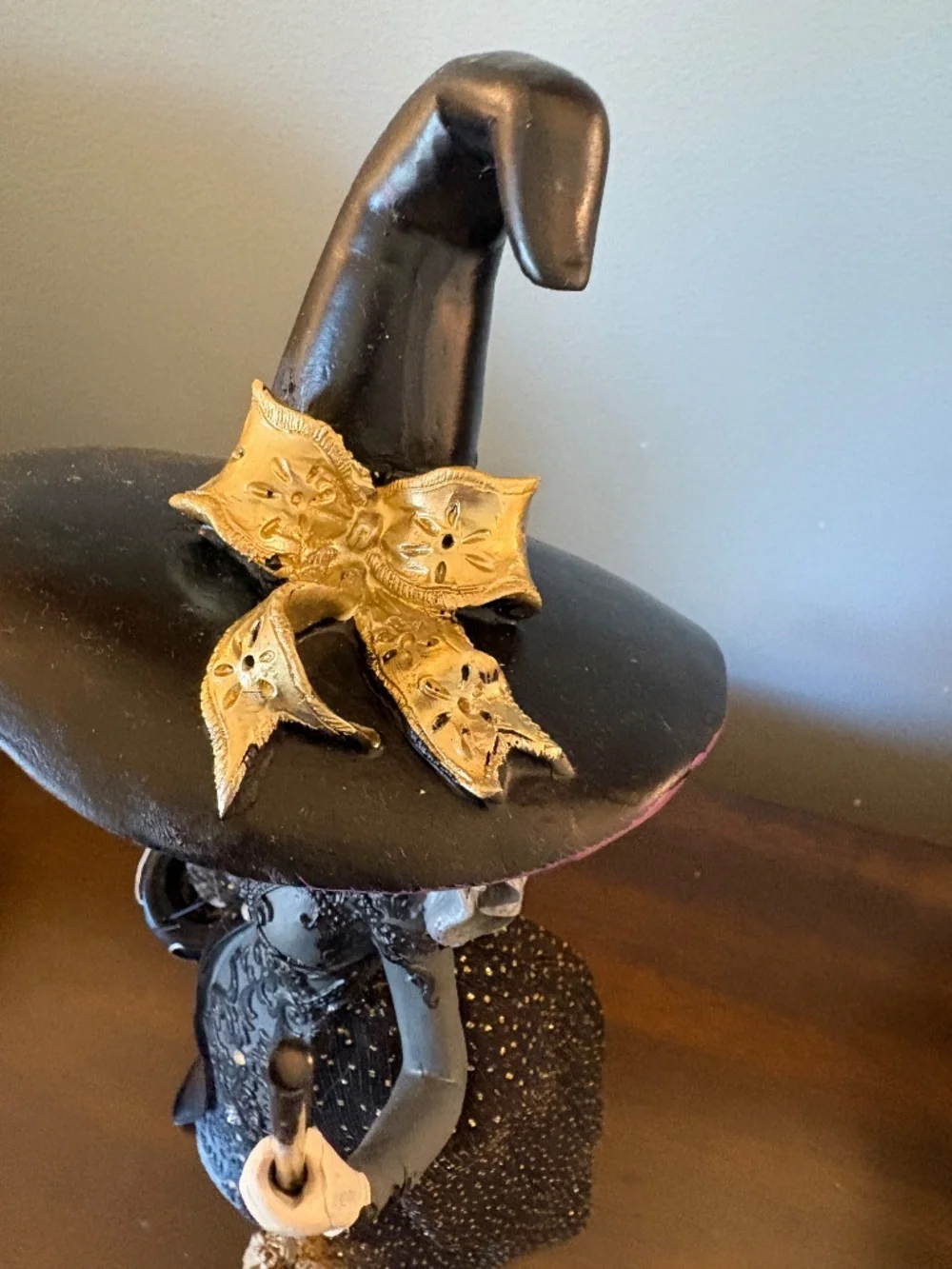 Elegant Black Witch Figurine with Purple Hat - Home Accents